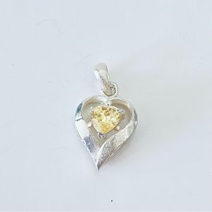 Sterling Silver .925 Yellow Crystal Heart Pendant 💜
Material: .925